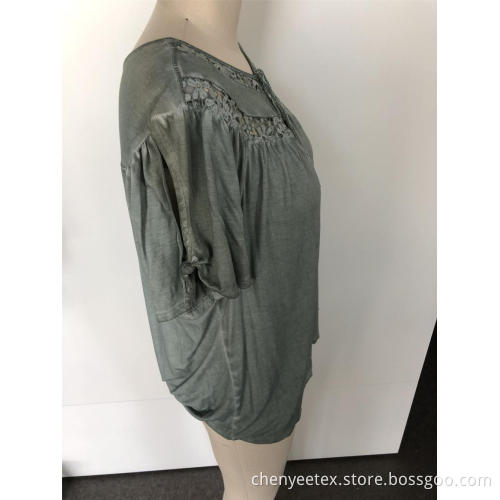 A short-sleeved blouse with tassel cut out